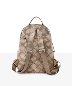 Back view of high-quality PU leather backpack with rhombus texture and anti-theft zipper
