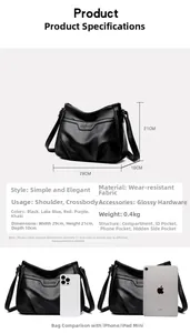 Detailed dimensions of the black embossed crossbody bag showing width 29cm and height 21cm
