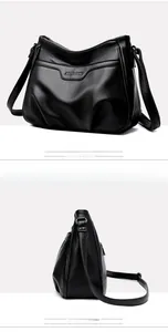 Macro shot of black embossed lychee texture leather handbag with ALLFANCY logo detail