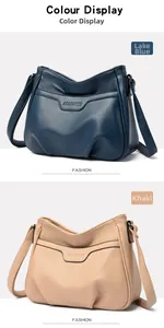 Vertical display showing lake blue and khaki pebbled leather crossbody bags