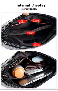Detailed interior of black leather shoulder bag with zipper pocket and multi-compartments