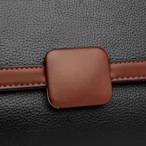 Classic black litchi grain leather crossbody bag with brown trim and square buckle detail