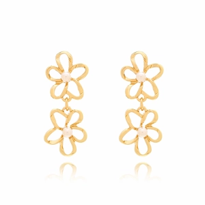 Golden multi-layer flower drop earrings with white pearls on a white background