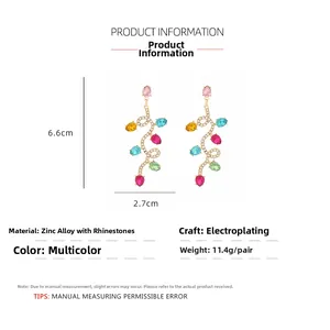 Detailed view of colorful rhinestone chandelier earrings showing dimensions 6.6cm x 2.7cm