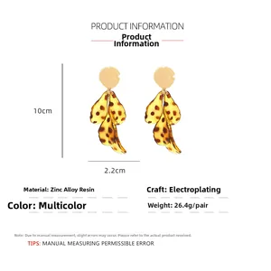 Detailed size view of long layered leopard print leaf earrings with zinc alloy and resin