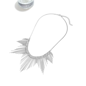 Minimalist silver fringe tassel necklace with multi-layered metal tubes on white background