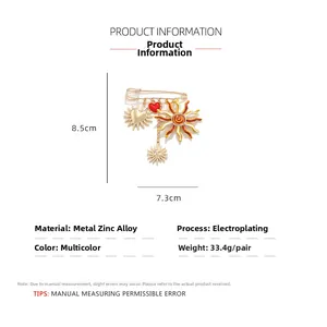 Detailed size chart for sun and heart pendant brooch with measurements of 8.5cm by 7.3cm