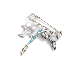 Western cowboy style brooch featuring bull head, boots, feathers and blue beads