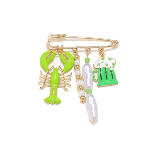 Exaggerated golden lobster pin brooch with green enamel charms and baroque pearls