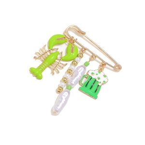 Nautical style gold brooch with colorful lobster and pearl charms for St. Patrick's Day