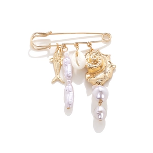 Marine style golden safety pin brooch with conch shell, fish charms, and baroque pearls