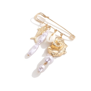 Tropical sea shell and fish charm safety pin brooch in gold finish with baroque pearls