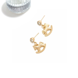 Exquisite gold-plated rocking horse earrings with sparkling rhinestone studs on white background
