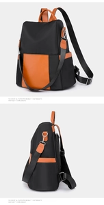 Detail view of water-resistant black nylon and brown leather panels on a versatile backpack