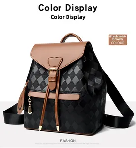 Detail of black diamond-quilted backpack with brown flap and golden buckle accent