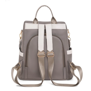 Sac à dos Oxford imperméable à la mode en gris et crème avec détails dorés