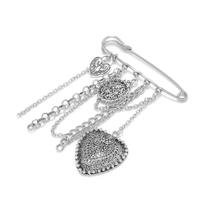 Vintage silver heart tassel brooch with multiple hanging chains and engraved charms