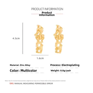 Detailed size view of gold fluid metal lava earrings measuring 4.5cm by 1.6cm