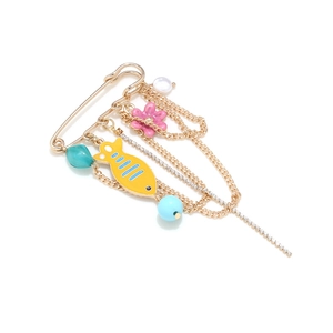 Golden safety pin brooch with enamel tropical fish, pink flower and blue beaded tassels