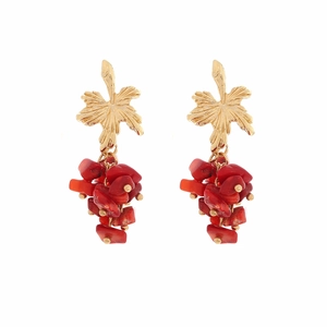 Bohemian style handmade drop earrings with gold leaf design and red stone beads
