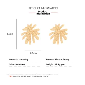 Detailed view of textured gold fireworks earrings with size dimensions and measurements