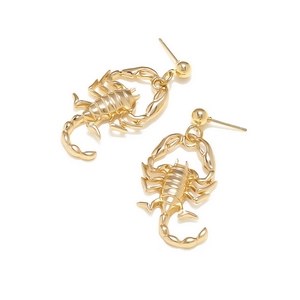 Gothic vintage gold scorpion drop earrings with detailed insect design on white background