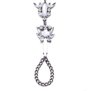 Macro view of vintage industrial style hand chain with dark grey alloy and crystals