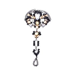 Gothic gunmetal hand chain bracelet with sparkling crystals for a vintage beach style