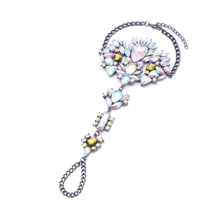 Detail of bohemian slave bracelet with iridescent AB rhinestones and gun black metal