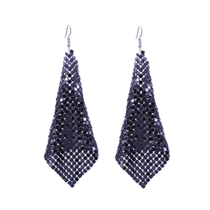 Macro shot of long black sequin mesh fringe earrings with metallic diamond-shaped design