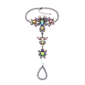 Gothic gunmetal slave bracelet with rainbow crystals and intricate finger ring chains
