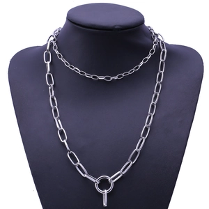 Detail of silver double-layered paperclip chain necklace with a rectangular pendant