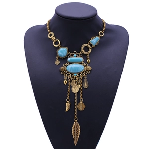 Bohemian vintage long necklace with turquoise stones and gold tassel charms