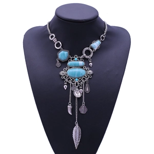 Bohemian long tassel necklace with turquoise stones and silver leaf pendant for women