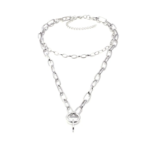 Detail of silver double-layer link chain necklace with minimalist pendants and adjustable clasp