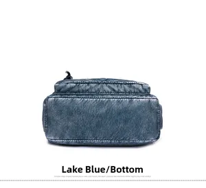 Detailed bottom view of lake blue washed PU leather bag with vintage crinkle texture