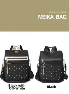 Detail view of quilted nylon backpacks in black and beige with metallic stud accents