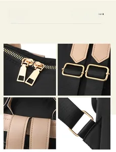 Close-up of golden hardware, zippers and leather stitching on the black nylon backpack