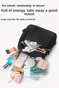 Spacious black quilted backpack with gold studs holding an iPad, notebook, and cosmetics
