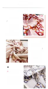 Macro detail of silk-like scarf featuring chain patterns and delicate satin floral texture