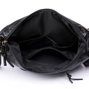 Retro washed PU leather shoulder bag for women featuring a spacious interior and pockets