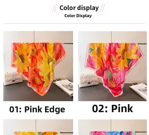 Detail of printed silk-like square scarves showing floral patterns and smooth texture