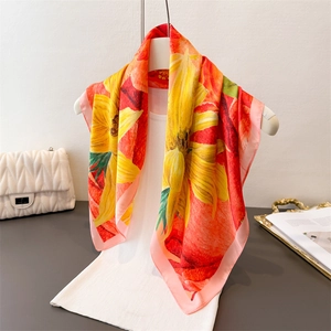 Elegant sunflower print silk scarf for women featuring vibrant yellow and red floral patterns