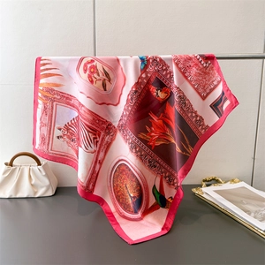 Detail of silk-like square scarf featuring vintage floral and zebra artistic patterns