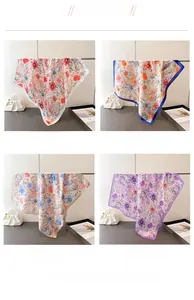 Detail showcasing four floral silk scarves in pink, blue, khaki and purple border colors
