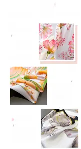 Detailed close-up of floral print imitation silk scarf with fine stitched edges