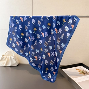 Floral print silk square scarf in navy blue with daisy and ginkgo leaf pattern