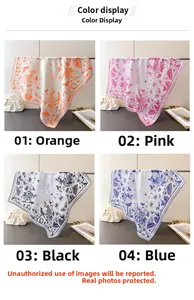 Detail view of four elegant floral bird print scarves in orange, pink, black and blue