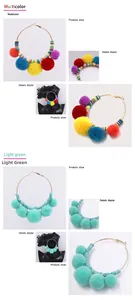 Detail of bohemian gold hoop earrings with colorful pom-poms and clay discs on a model