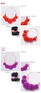 Detail of bohemian hoop earrings with colorful plush pom-poms and metal accents